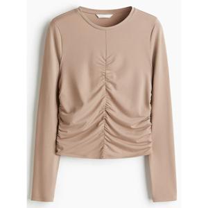 Top drapeado de manga larga